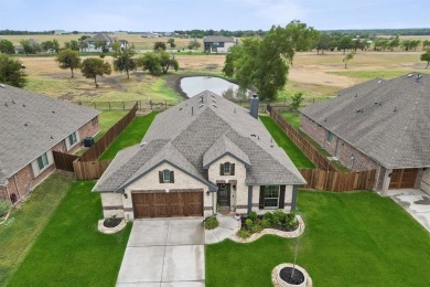 Single story home with outstanding golf course views in the on Stone River Golf Club in Texas - for sale on GolfHomes.com, golf home, golf lot