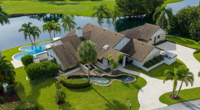 Enveloped within the beauty of its natural setting and defined on Seagate Country Club in Florida - for sale on GolfHomes.com, golf home, golf lot