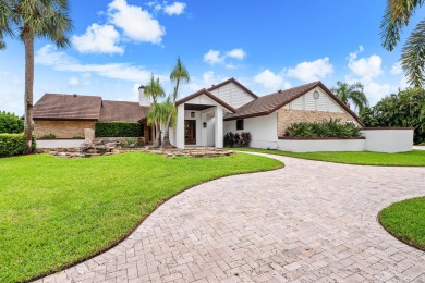 Enveloped within the beauty of its natural setting and defined on Seagate Country Club in Florida - for sale on GolfHomes.com, golf home, golf lot