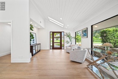 Enveloped within the beauty of its natural setting and defined on Seagate Country Club in Florida - for sale on GolfHomes.com, golf home, golf lot