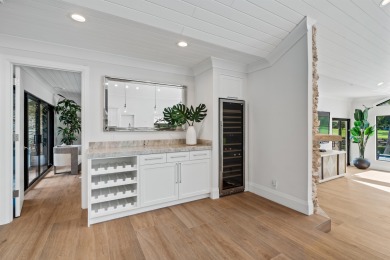 Enveloped within the beauty of its natural setting and defined on Seagate Country Club in Florida - for sale on GolfHomes.com, golf home, golf lot