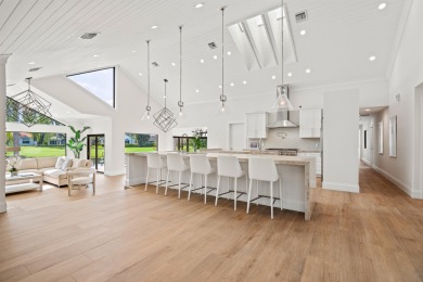 Enveloped within the beauty of its natural setting and defined on Seagate Country Club in Florida - for sale on GolfHomes.com, golf home, golf lot