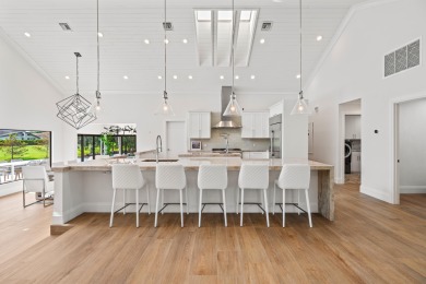 Enveloped within the beauty of its natural setting and defined on Seagate Country Club in Florida - for sale on GolfHomes.com, golf home, golf lot