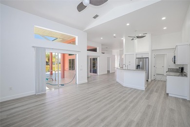 Waterview Pool Home in Deep Creek - 27099 Ecuador Dr. Punta on Deep Creek Golf Club in Florida - for sale on GolfHomes.com, golf home, golf lot