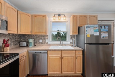 NEW LOOK, NEW PRICE, same dreamy beach life! Welcome to your on Nags Head Golf Links in North Carolina - for sale on GolfHomes.com, golf home, golf lot