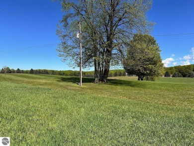 Sweeping views overlooking the 4th hole of the Centennial Farm on The Centennial Farm Golf Club in Michigan - for sale on GolfHomes.com, golf home, golf lot