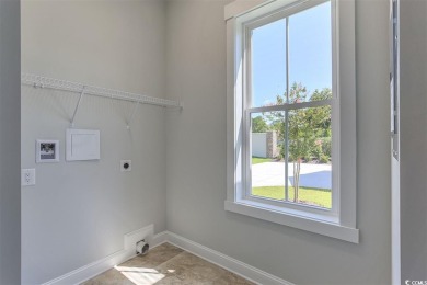 At 2,196 heated sqft, the two story Cooper home located on lot on The Dunes Golf and Beach Club in South Carolina - for sale on GolfHomes.com, golf home, golf lot