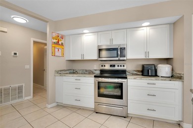 Welcome to this beautifully updated pool home on a spacious on Port Charlotte Golf Club in Florida - for sale on GolfHomes.com, golf home, golf lot