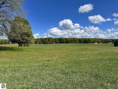 Sweeping views overlooking the 4th hole of the Centennial Farm on The Centennial Farm Golf Club in Michigan - for sale on GolfHomes.com, golf home, golf lot