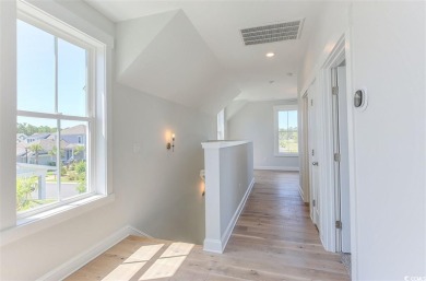 At 2,196 heated sqft, the two story Cooper home located on lot on The Dunes Golf and Beach Club in South Carolina - for sale on GolfHomes.com, golf home, golf lot
