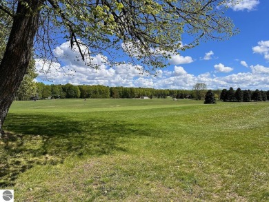 Sweeping views overlooking the 4th hole of the Centennial Farm on The Centennial Farm Golf Club in Michigan - for sale on GolfHomes.com, golf home, golf lot