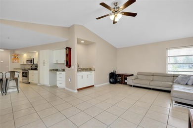 Welcome to this beautifully updated pool home on a spacious on Port Charlotte Golf Club in Florida - for sale on GolfHomes.com, golf home, golf lot