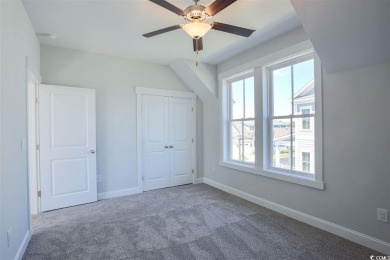 At 2,196 heated sqft, the two story Cooper home located on lot on The Dunes Golf and Beach Club in South Carolina - for sale on GolfHomes.com, golf home, golf lot