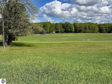 Sweeping views overlooking the 4th hole of the Centennial Farm on The Centennial Farm Golf Club in Michigan - for sale on GolfHomes.com, golf home, golf lot