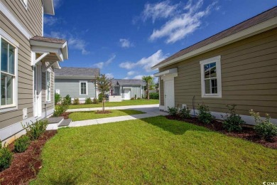 At 2,196 heated sqft, the two story Cooper home located on lot on The Dunes Golf and Beach Club in South Carolina - for sale on GolfHomes.com, golf home, golf lot