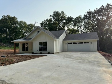 Beautiful modern 2025 New Build across from the North Golf on Cherokee Village North Course in Arkansas - for sale on GolfHomes.com, golf home, golf lot