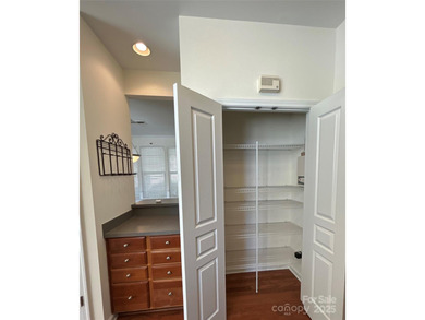 Located in the highly desirable Highland Creek community, this on Highland Creek Golf Club in North Carolina - for sale on GolfHomes.com, golf home, golf lot