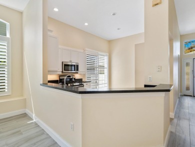 Spacious and bright larger 2-bedroom villa plus den and 2 full on University Park Country Club in Florida - for sale on GolfHomes.com, golf home, golf lot
