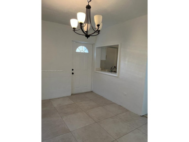 GREAT OPPORTUNITY!! NO RESTRICTIONS!! Updated 2/1 plus 1 car on Sunrise Lakes Phase III in Florida - for sale on GolfHomes.com, golf home, golf lot