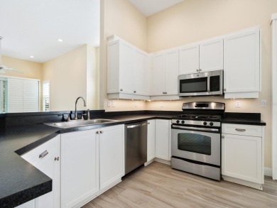 Spacious and bright larger 2-bedroom villa plus den and 2 full on University Park Country Club in Florida - for sale on GolfHomes.com, golf home, golf lot