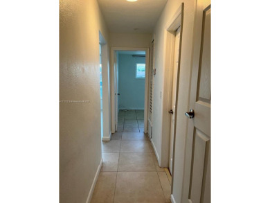 GREAT OPPORTUNITY!! NO RESTRICTIONS!! Updated 2/1 plus 1 car on Sunrise Lakes Phase III in Florida - for sale on GolfHomes.com, golf home, golf lot