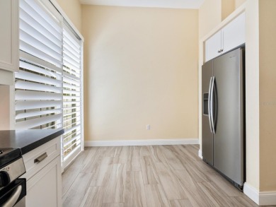 Spacious and bright larger 2-bedroom villa plus den and 2 full on University Park Country Club in Florida - for sale on GolfHomes.com, golf home, golf lot