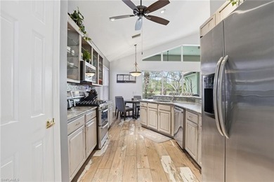 Experience sweeping 180-degree water and golf course views from on  in Florida - for sale on GolfHomes.com, golf home, golf lot