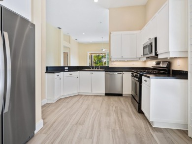 Spacious and bright larger 2-bedroom villa plus den and 2 full on University Park Country Club in Florida - for sale on GolfHomes.com, golf home, golf lot