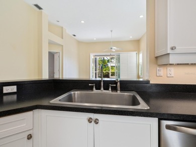 Spacious and bright larger 2-bedroom villa plus den and 2 full on University Park Country Club in Florida - for sale on GolfHomes.com, golf home, golf lot