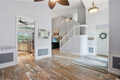 Experience sweeping 180-degree water and golf course views from on  in Florida - for sale on GolfHomes.com, golf home, golf lot