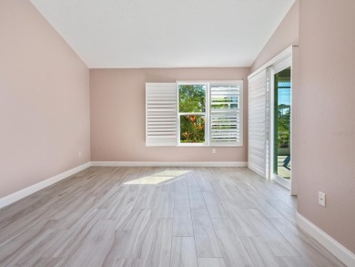 Spacious and bright larger 2-bedroom villa plus den and 2 full on University Park Country Club in Florida - for sale on GolfHomes.com, golf home, golf lot