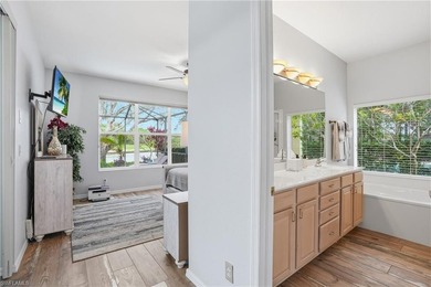 Experience sweeping 180-degree water and golf course views from on  in Florida - for sale on GolfHomes.com, golf home, golf lot