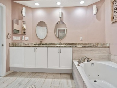 Spacious and bright larger 2-bedroom villa plus den and 2 full on University Park Country Club in Florida - for sale on GolfHomes.com, golf home, golf lot