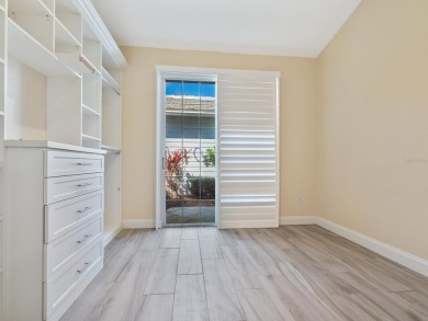 Spacious and bright larger 2-bedroom villa plus den and 2 full on University Park Country Club in Florida - for sale on GolfHomes.com, golf home, golf lot
