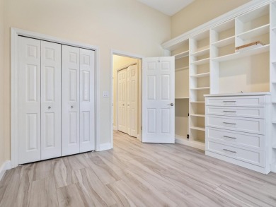 Spacious and bright larger 2-bedroom villa plus den and 2 full on University Park Country Club in Florida - for sale on GolfHomes.com, golf home, golf lot