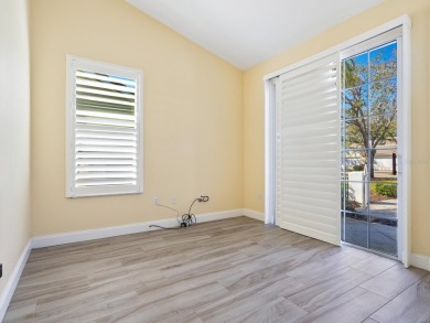 Spacious and bright larger 2-bedroom villa plus den and 2 full on University Park Country Club in Florida - for sale on GolfHomes.com, golf home, golf lot