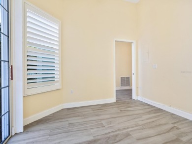Spacious and bright larger 2-bedroom villa plus den and 2 full on University Park Country Club in Florida - for sale on GolfHomes.com, golf home, golf lot