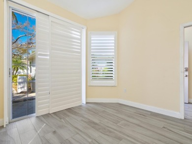 Spacious and bright larger 2-bedroom villa plus den and 2 full on University Park Country Club in Florida - for sale on GolfHomes.com, golf home, golf lot