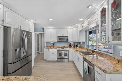 Under contract-accepting backup offers. **Improved on Gulf Harbors Golf Course in Florida - for sale on GolfHomes.com, golf home, golf lot