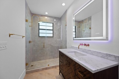 Experience luxury living in this exquisitely renovated, fully on Palm Beach Polo and Country Club in Florida - for sale on GolfHomes.com, golf home, golf lot
