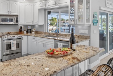 Under contract-accepting backup offers. **Improved on Gulf Harbors Golf Course in Florida - for sale on GolfHomes.com, golf home, golf lot