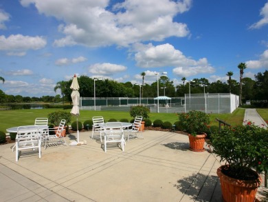 Spacious and bright larger 2-bedroom villa plus den and 2 full on University Park Country Club in Florida - for sale on GolfHomes.com, golf home, golf lot