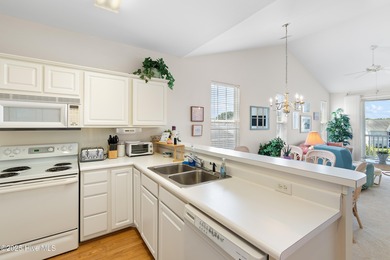 Welcome to your dream getaway or forever home! This fully on Sandpiper Bay Golf and Country Club in North Carolina - for sale on GolfHomes.com, golf home, golf lot