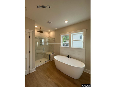 Experience the perfect blend of timeless architecture and on The Currituck Golf Club in North Carolina - for sale on GolfHomes.com, golf home, golf lot