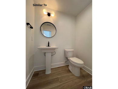 Experience the perfect blend of timeless architecture and on The Currituck Golf Club in North Carolina - for sale on GolfHomes.com, golf home, golf lot