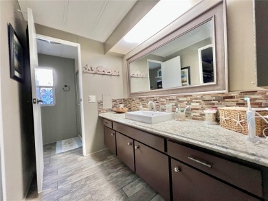 Under contract-accepting backup offers. This beautifully on Fairway Village Golf Course in Florida - for sale on GolfHomes.com, golf home, golf lot