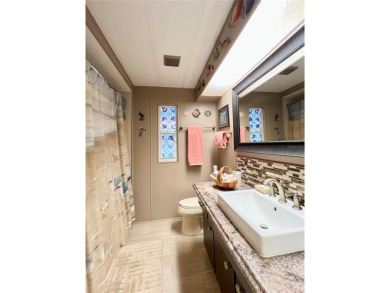 Under contract-accepting backup offers. This beautifully on Fairway Village Golf Course in Florida - for sale on GolfHomes.com, golf home, golf lot