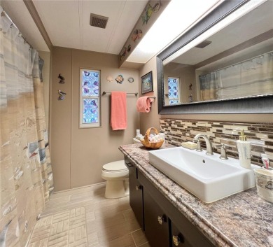 Under contract-accepting backup offers. This beautifully on Fairway Village Golf Course in Florida - for sale on GolfHomes.com, golf home, golf lot
