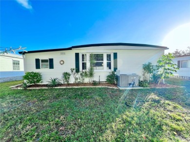 Under contract-accepting backup offers. This beautifully on Fairway Village Golf Course in Florida - for sale on GolfHomes.com, golf home, golf lot