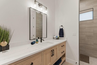 On the golf course, with a backyard oasis including a pool on The Ledges Golf Club in Utah - for sale on GolfHomes.com, golf home, golf lot